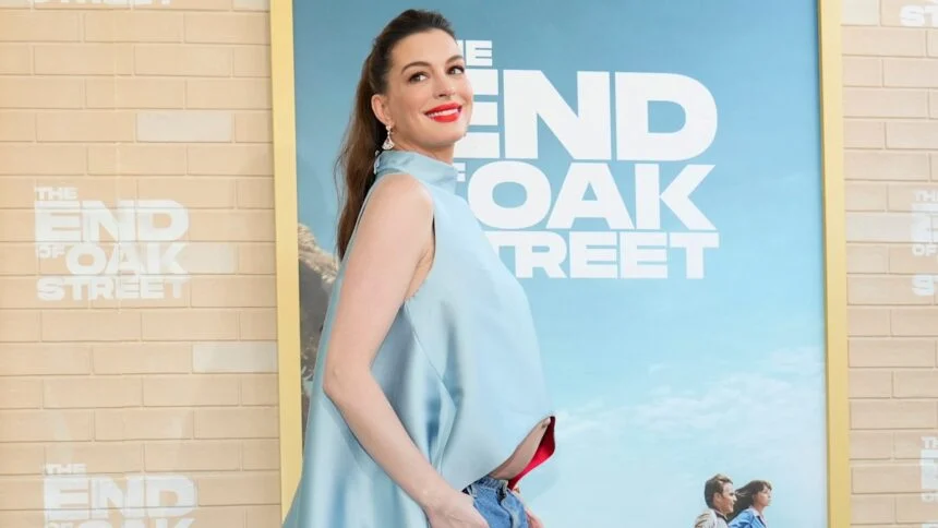 Anne-Hathaway-Flaunts-Baby-Bump-at-The-End-of-Oak-860x484